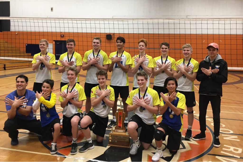 The MEI Eagles junior volleyball team celebrates a provincial win in Kamloops on Saturday.
